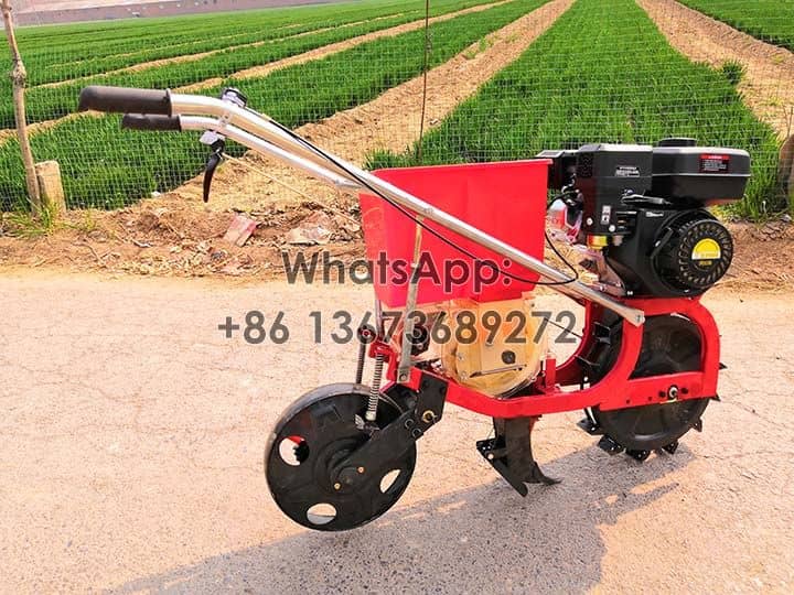 Gasoline equipped manual corn seeder